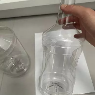 PET Round Bottles with Black Ribbed SG90 Lined Caps